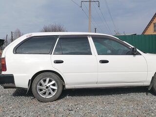 2002 Toyota Corolla VII (E100), белый, 330000 рублей, вид 1