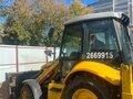 2007 New Holland B110B, жёлтый, 3900000 рублей