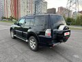 2012 Mitsubishi Pajero IV Рестайлинг 1, чёрный - вид 4