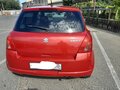 2004 Suzuki Swift III, пурпурный - вид 1