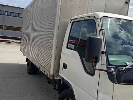 1998 Isuzu Elf (N-series), белый, 880000 рублей, вид 1