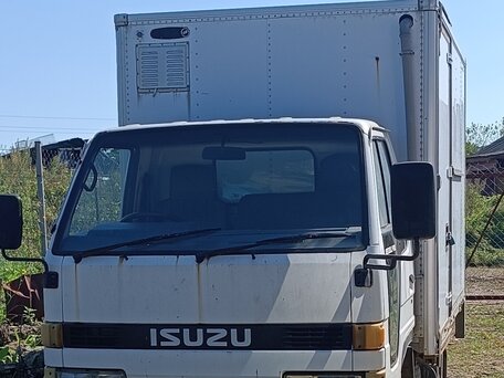1992 Isuzu Elf (N-series), белый, 650000 рублей, вид 1