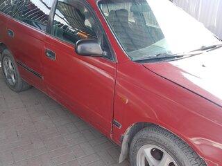 1997 Toyota Carina E, пурпурный, 305000 рублей, вид 4