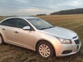 2010 Chevrolet Cruze I, серебристый, 540000 рублей - вид 1