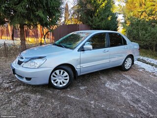 2006 Mitsubishi Lancer IX Рестайлинг, серебристый, 275000 рублей, вид 3