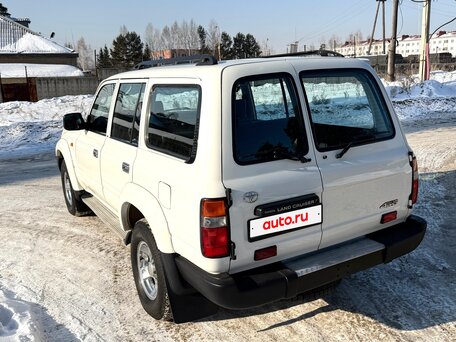 1997 Toyota Land Cruiser 80 Series Рестайлинг, белый, 2350000 рублей, вид 5