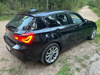 2018 BMW 1 серии 118i II (F20/F21) Рестайлинг 2, чёрный, 1366677 рублей, вид 2