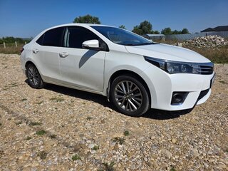 2013 Toyota Corolla XI (E160, E170, E180), белый, 1030000 рублей, вид 1
