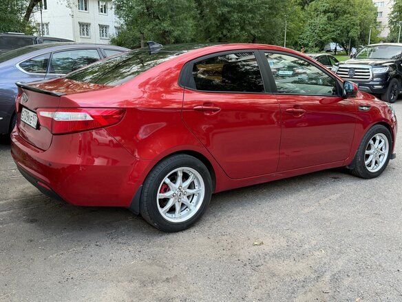 2011 Kia Rio III, красный - вид 5