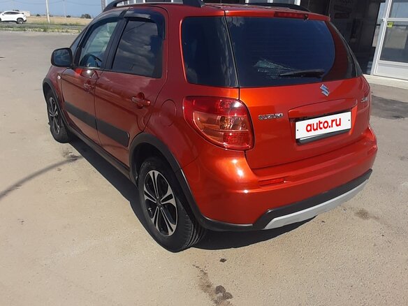 2013 Suzuki SX4 I (Classic) Рестайлинг, оранжевый, 1300000 рублей - вид 6