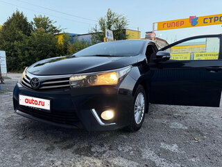 2014 Toyota Corolla XI (E160, E170, E180), чёрный, 880000 рублей, вид 1