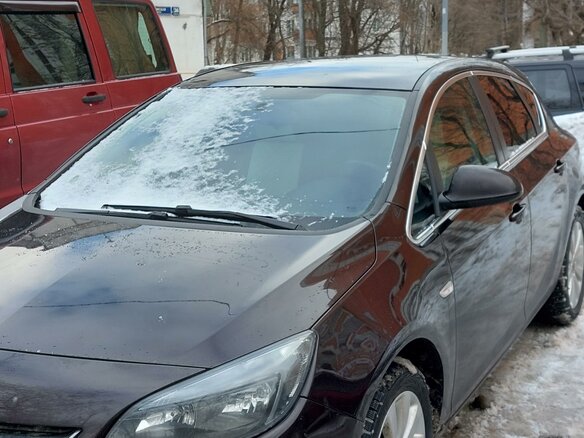 2014 Opel Astra J Рестайлинг, коричневый, 945000 рублей