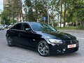 2009 BMW 3 серии 320i V (E90/E91/E92/E93) Рестайлинг, чёрный - вид 2
