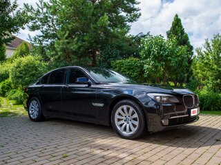 2009 BMW 7 серии 750i xDrive V (F01/F02/F04), чёрный, 3190000 рублей, вид 1