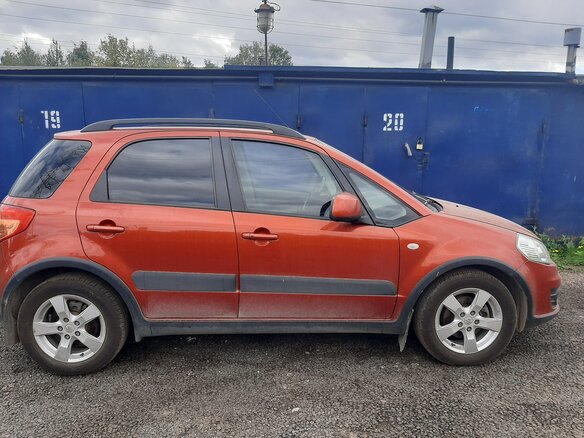 2012 Suzuki SX4 I (Classic) Рестайлинг, оранжевый, 950000 рублей
