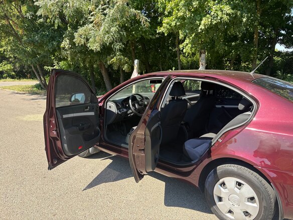 2010 Skoda Octavia II (A5) Рестайлинг, пурпурный, 850000 рублей - вид 7