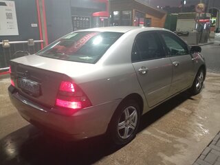 2003 Toyota Corolla IX (E120, E130), золотистый, 500000 рублей, вид 4