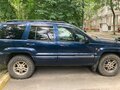 2004 Jeep Grand Cherokee II (WJ), синий - вид 2