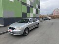 2003 Toyota Corolla IX (E120, E130), серый, 550000 рублей