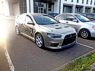 2007 Mitsubishi Lancer X, золотистый, 1300000 рублей, вид 1