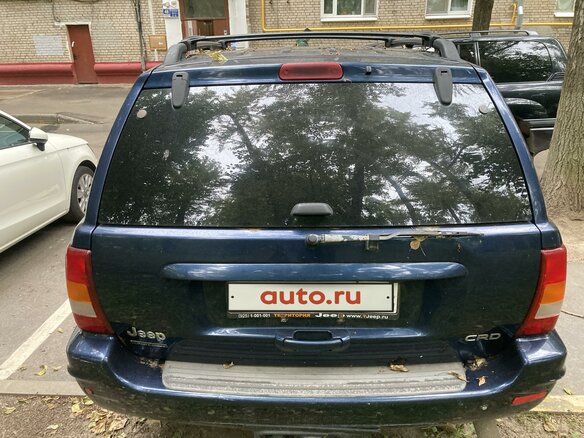 2004 Jeep Grand Cherokee II (WJ), синий - вид 3