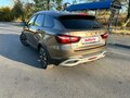 2024 Lada (ВАЗ) Vesta SW Cross I Рестайлинг (NG), коричневый, 1430000 рублей - вид 1