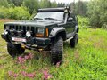 1997 Jeep Cherokee II (XJ) Рестайлинг, зелёный - вид 1