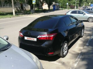 2014 Toyota Corolla XI (E160, E170, E180), чёрный, 1700000 рублей, вид 3