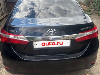 2013 Toyota Corolla XI (E160, E170, E180), чёрный, 1100000 рублей, вид 2