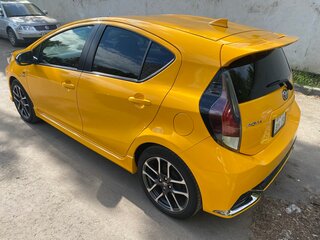 2019 Toyota Aqua I Рестайлинг 2, жёлтый, 1850000 рублей, вид 3