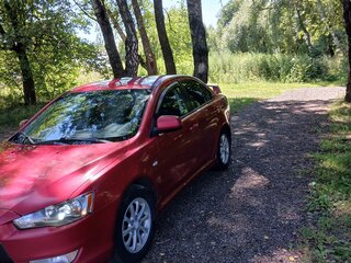 2010 Mitsubishi Lancer X, красный, 615000 рублей, вид 2