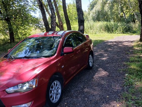 2010 Mitsubishi Lancer X, красный, 615000 рублей, вид 2