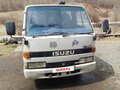 1992 Isuzu Elf (N-series), белый, 750000 рублей - вид 2