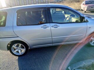 2007 Toyota Raum II, серебристый, 700000 рублей, вид 2