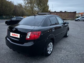 2010 Kia Rio II Рестайлинг, чёрный, 420000 рублей, вид 5