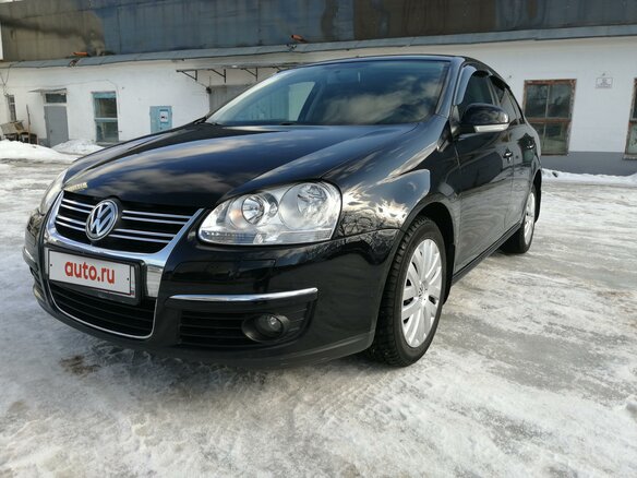 2010 Volkswagen Jetta V, чёрный, 675000 рублей
