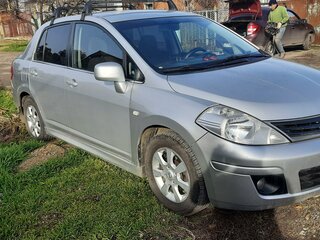 2012 Nissan Tiida I Рестайлинг, серебристый, 820000 рублей, вид 1