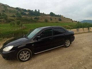2007 Mitsubishi Lancer IX Рестайлинг, чёрный, 450000 рублей, вид 5