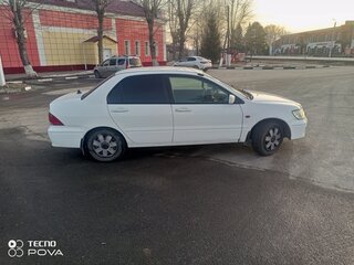2002 Mitsubishi Lancer Cedia IX, белый, 420000 рублей, вид 4