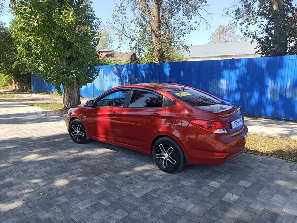 2011 Hyundai Solaris I, красный - вид 4