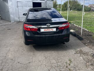 2012 Toyota Camry VII (XV50), чёрный, 1700000 рублей, вид 3