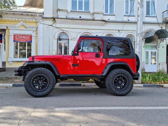 1993 Jeep Wrangler I (YJ), красный, 2100000 рублей - вид 7
