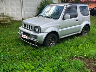 2011 Suzuki Jimny III Рестайлинг 1, серебристый, 870000 рублей, вид 1