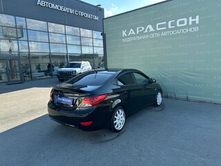 2013 Hyundai Solaris I, чёрный, 676000 рублей, вид 2