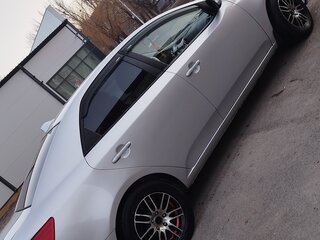 2010 Kia Cerato 5-speed II, серебристый, 560000 рублей, вид 4