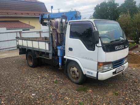 1990 Isuzu Elf (N-series), белый, 2450000 рублей, вид 3