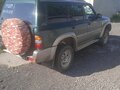 1998 Nissan Patrol V (Y61), зелёный, 850000 рублей - вид 4