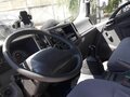 2018 Isuzu Elf (N-series), белый, 3799000 рублей - вид 7