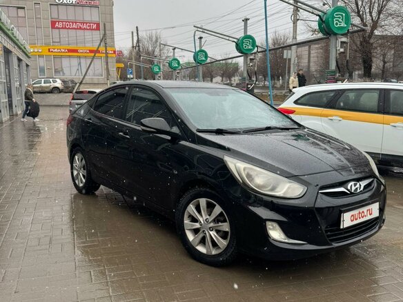 2012 Hyundai Solaris I, чёрный, 900000 рублей - вид 1