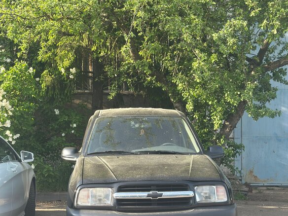 1999 Chevrolet Tracker II, чёрный - вид 3